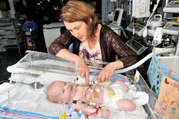 Rosalind McMullan with baby Luke, birminghammail.co.uk